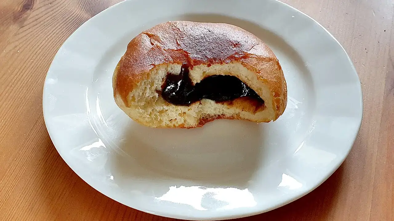 Jam doughnut, bitten
